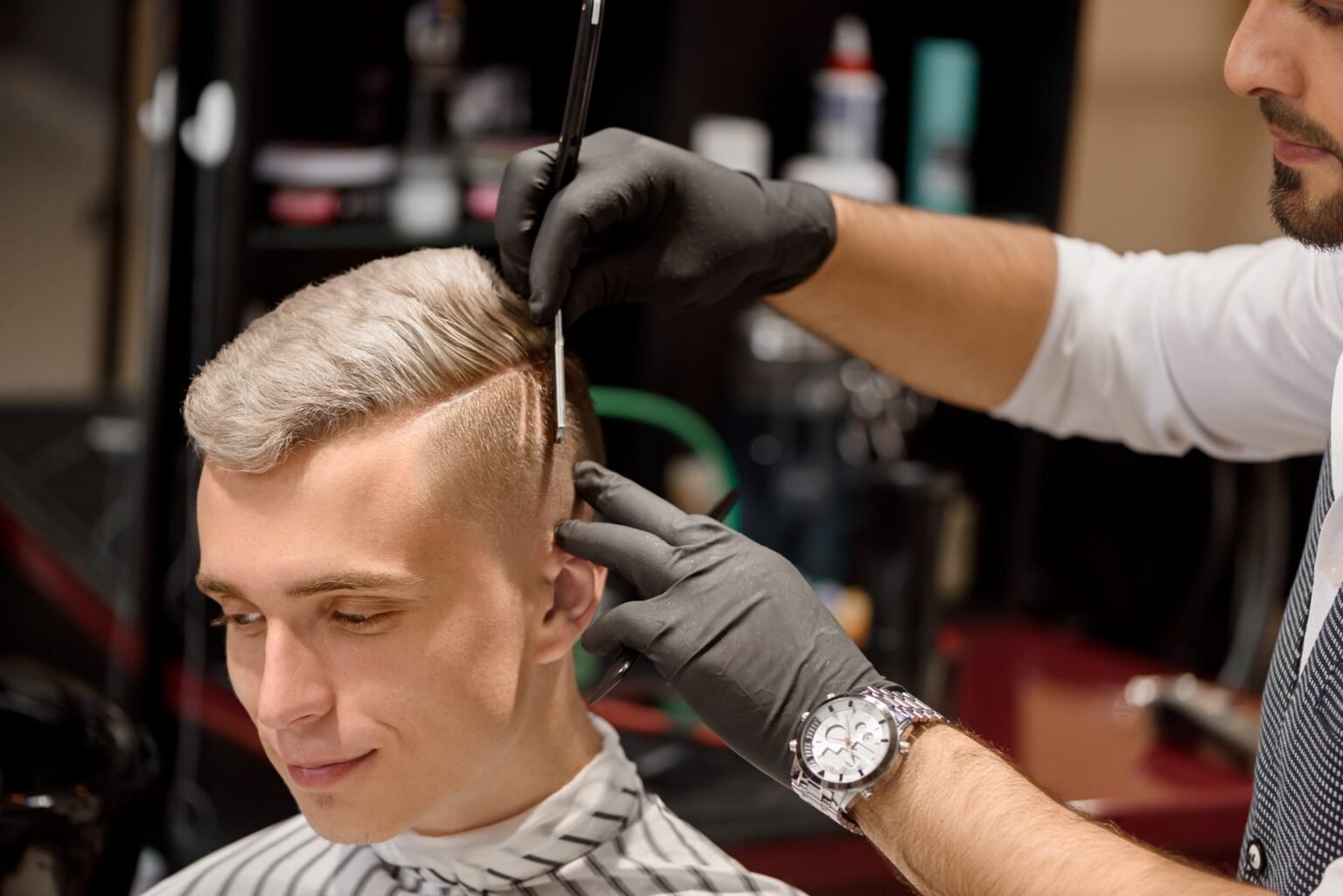 Professional barber providing a detailed men's haircut and grooming service in Miramar FL